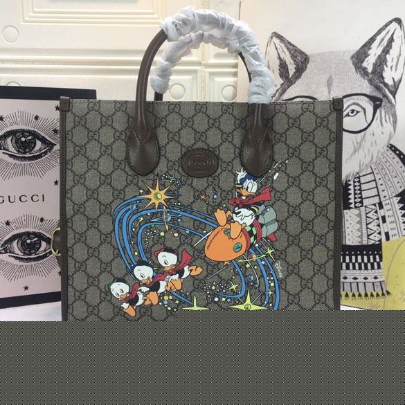 G*u*i shopping bags